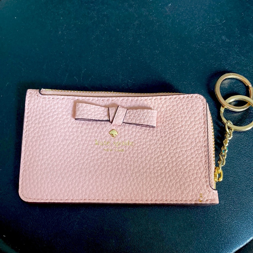 Kate Spade keychain/ cardholders. Slight marking on backside